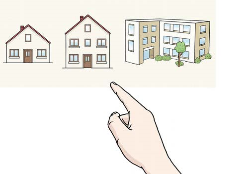 Eine Hand wählt zwischen verschiedenen Wohngebäuden aus.