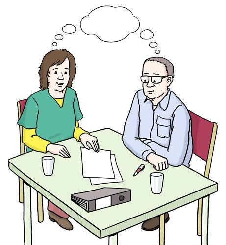 Zwei Menschen sitzen an einem Tisch und denken gemeinsam nach.
