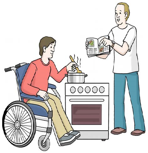 Ein Mensch im Rollstuhl kocht mit seiner Assistenz Essen. 