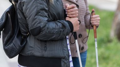 Zwei personen mit Langstock Zwei Personen mit Langstock