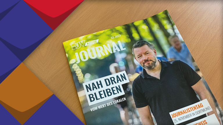 Ein Heft des DJV Mitgliederjournals auf einem Tisch